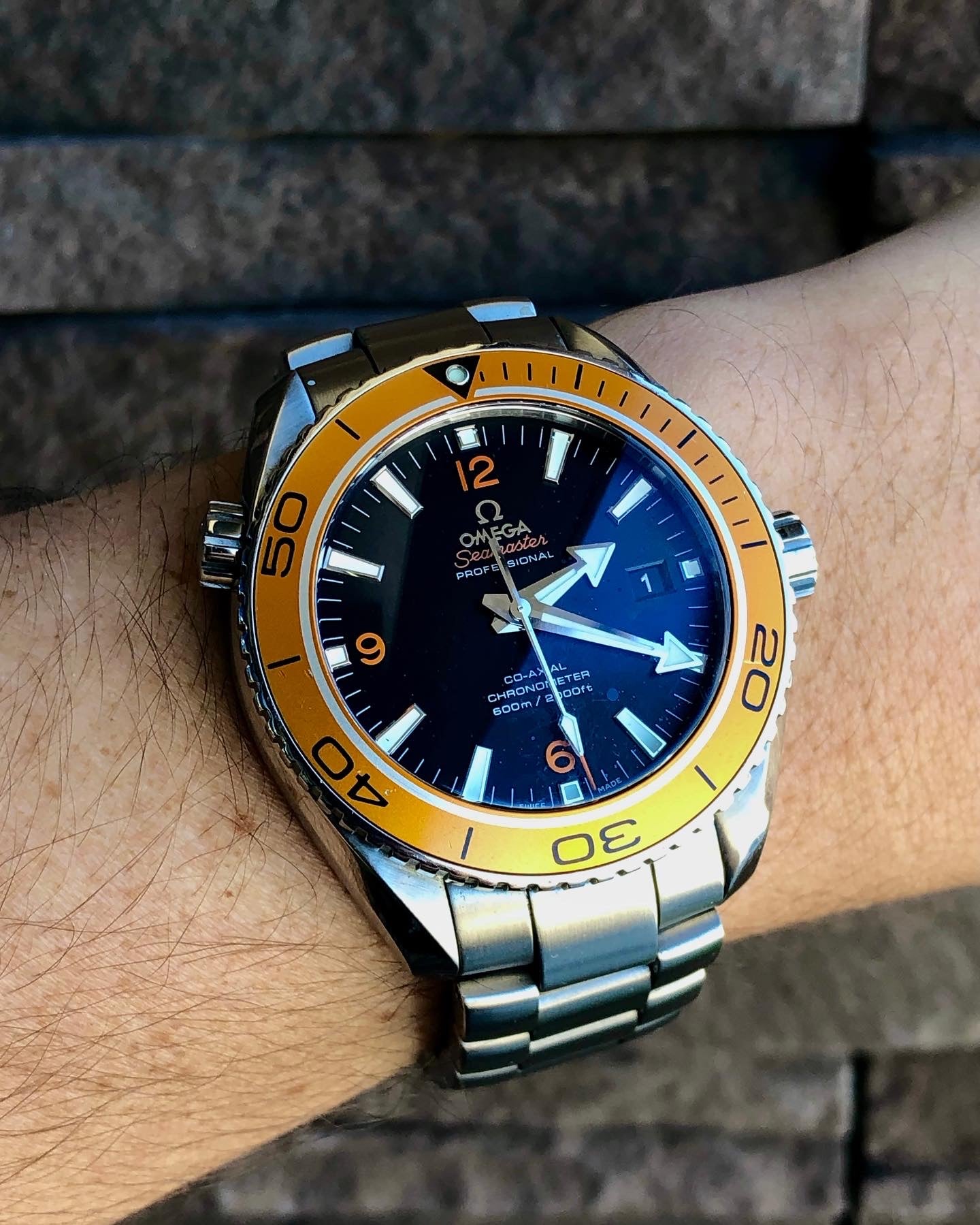 Omega Seamaster Planet Ocean With Orange Bezel - The Village Jeweler