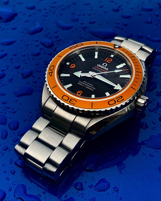 Omega Seamaster Planet Ocean With Orange Bezel - The Village Jeweler