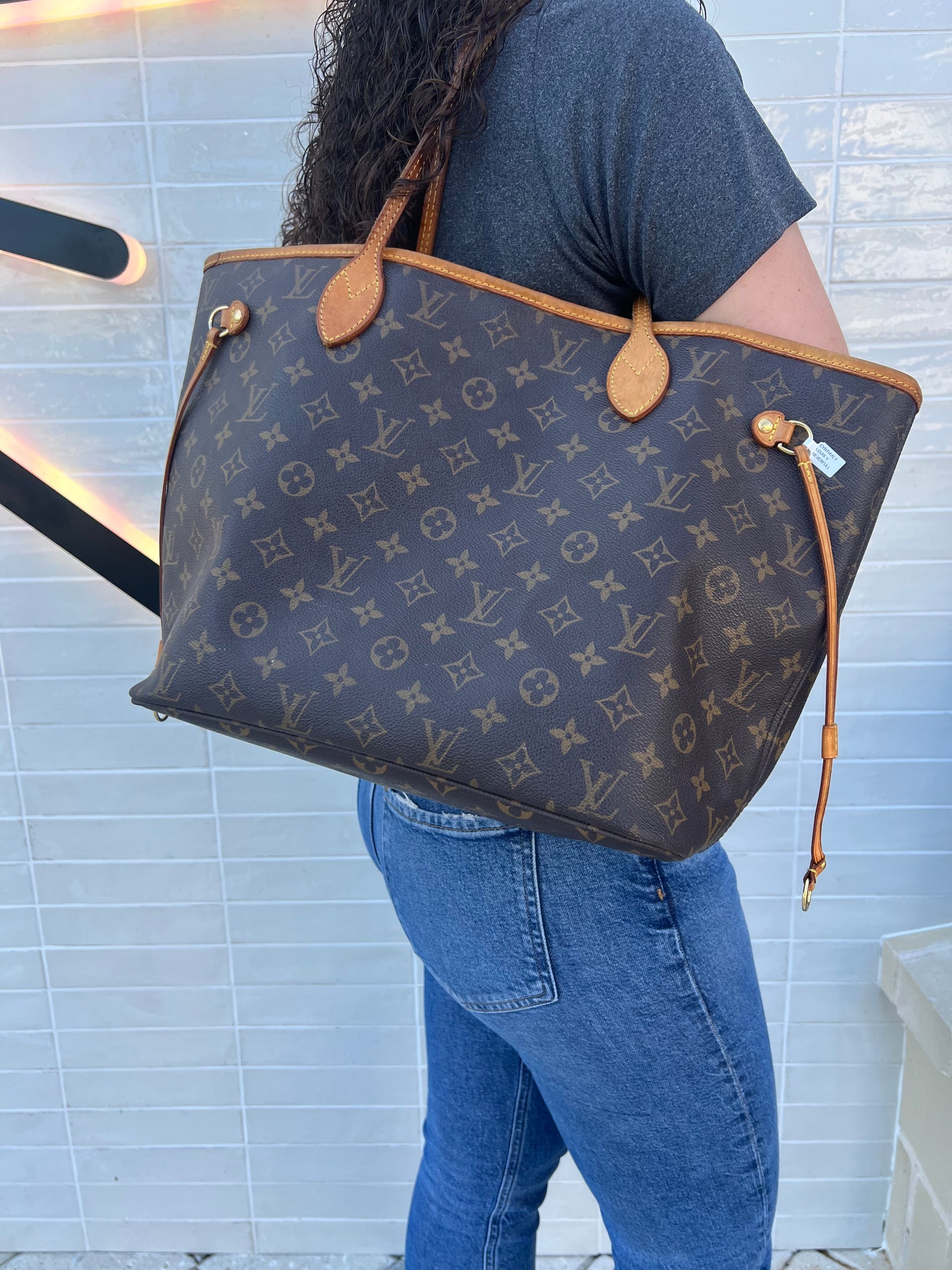 Neverfull leather tote Louis Vuitton Brown in Leather - 31575232